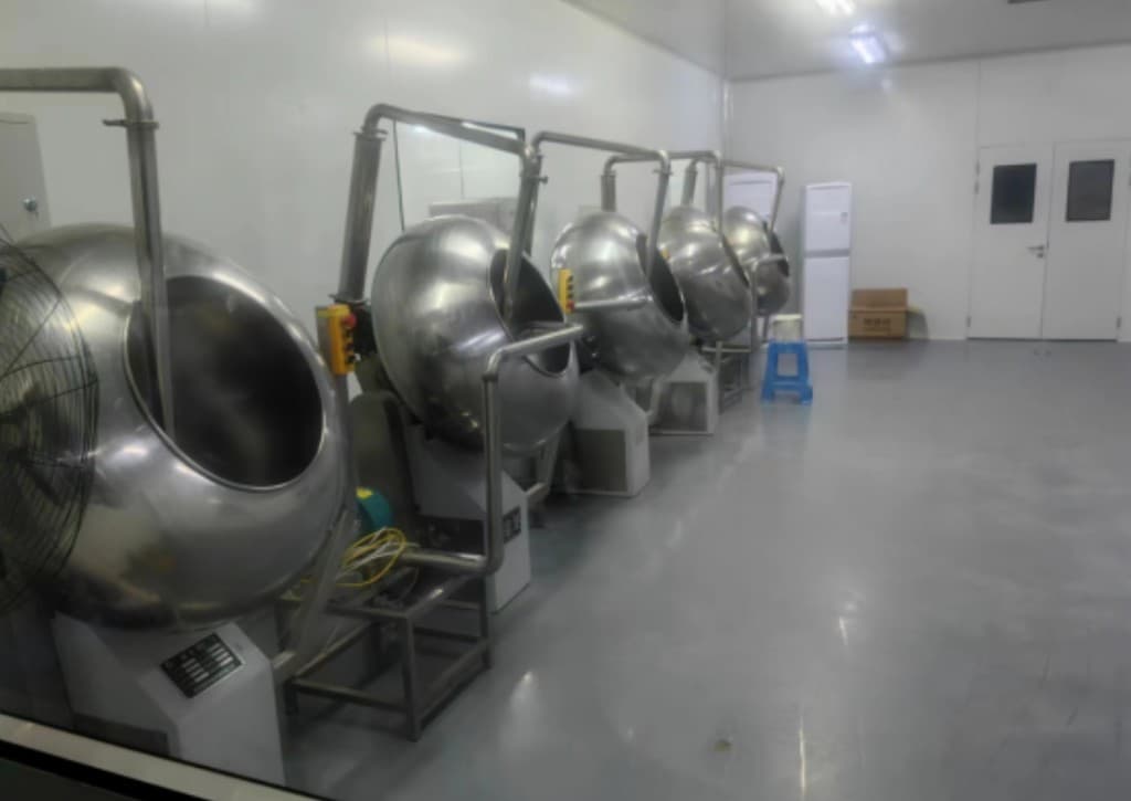 Coating pans for tablets and chews