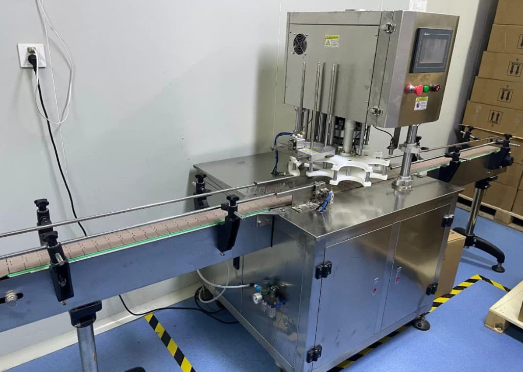 Capping and bottling station