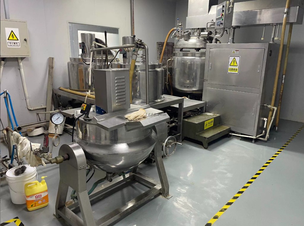 Stainless mixing tanks in the blending room